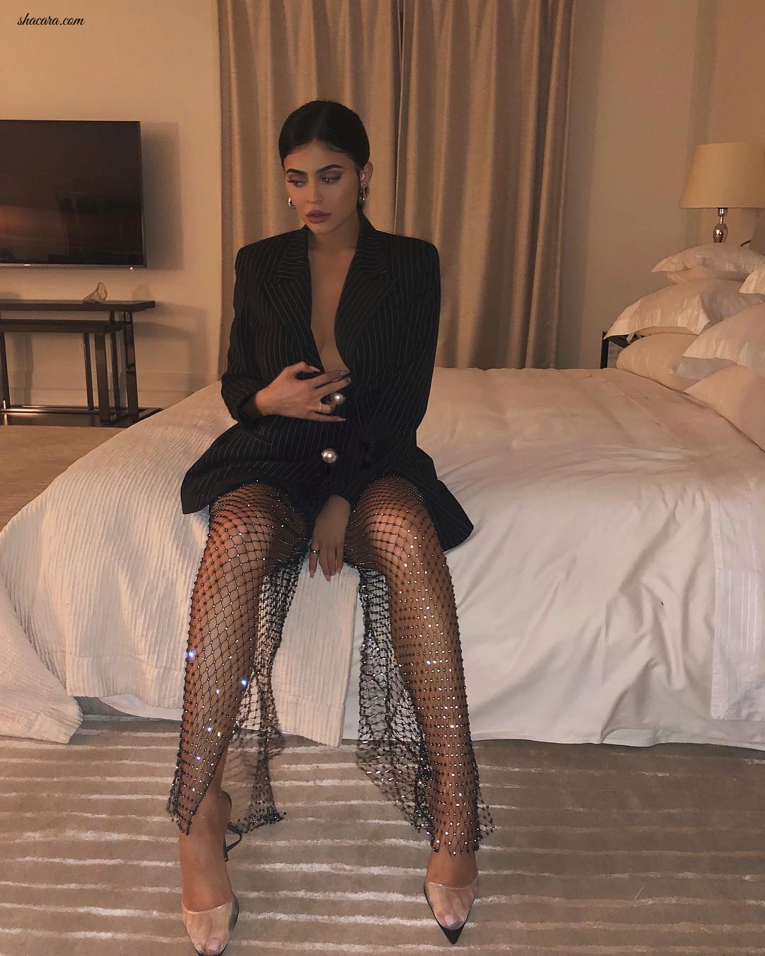 Weekend Slay! Kylie Jenner Stuns In Pinstripe And Sparkling Fishnet Combo