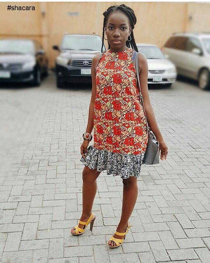 BEAUTIFUL LATEST STYLE BEING SEWED WITH SOME COLOURFUL ANKARA PRINT