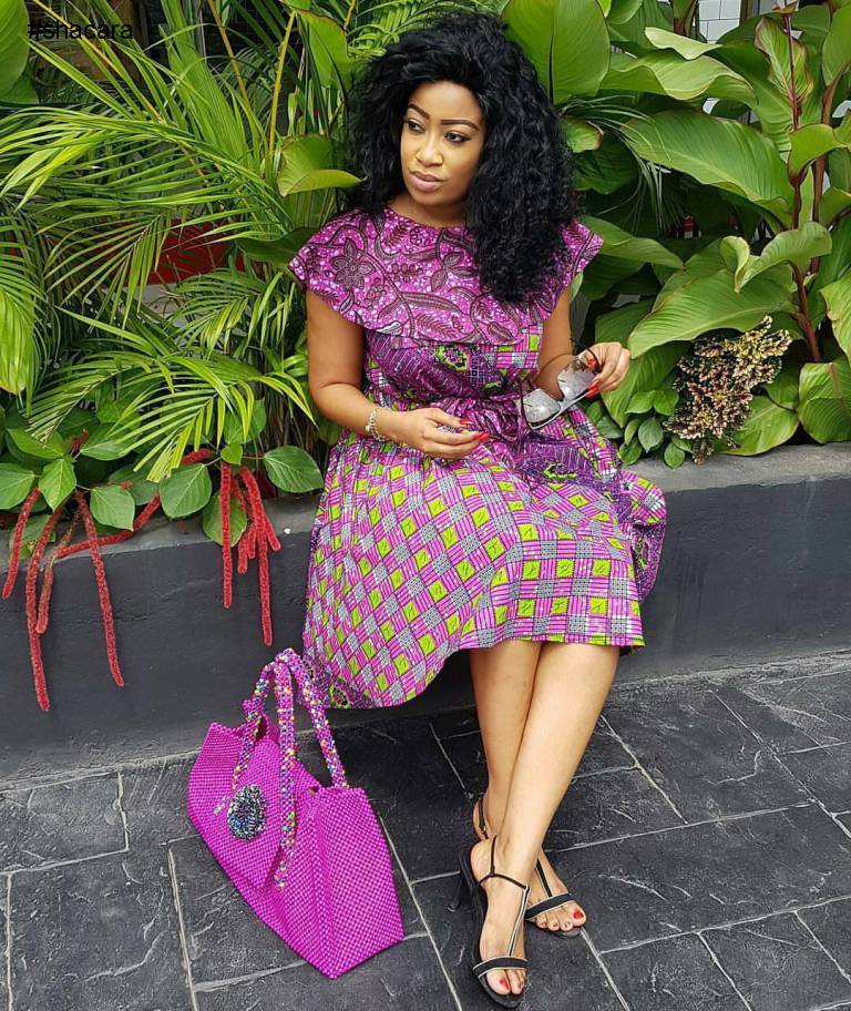 BEAUTIFUL LATEST STYLE BEING SEWED WITH SOME COLOURFUL ANKARA PRINT
